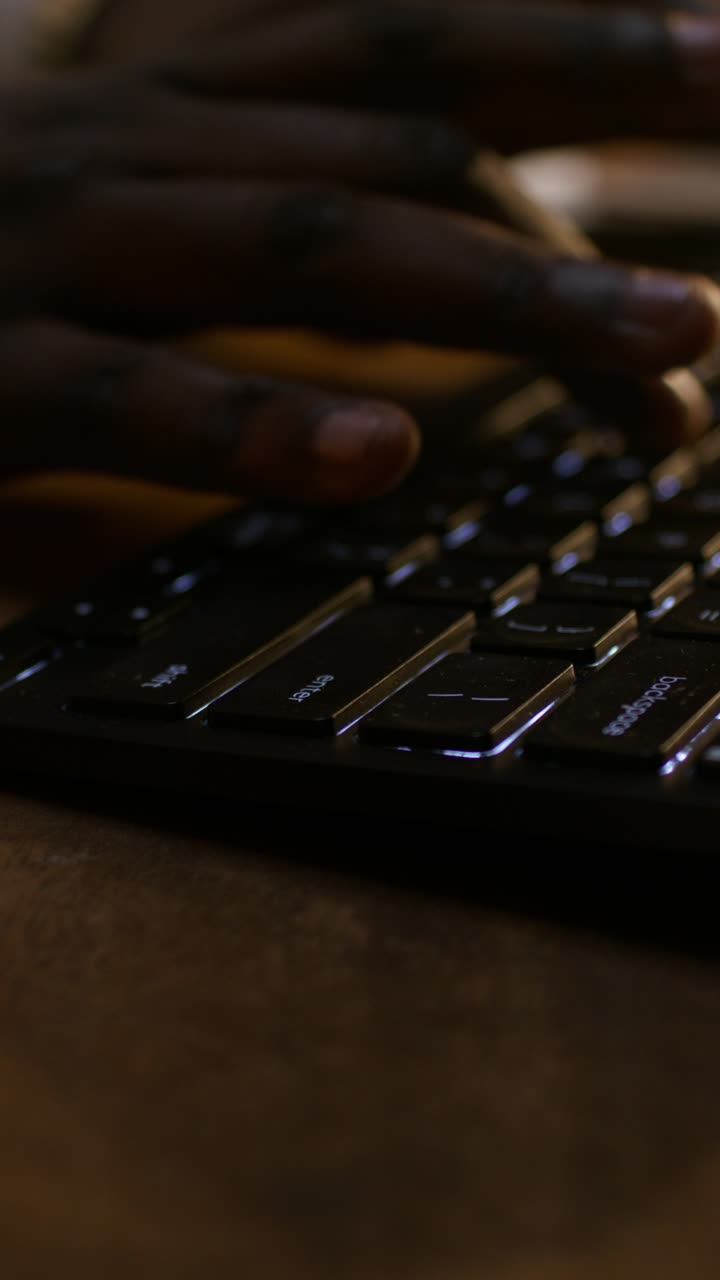 Hands Typing on a Keyboard