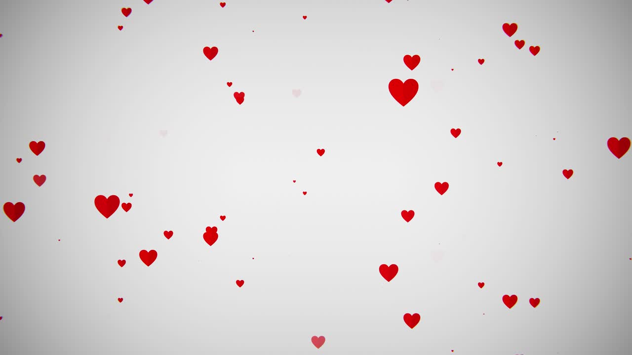 Cuori rossi animati che fluttuano su uno sfondo bianco