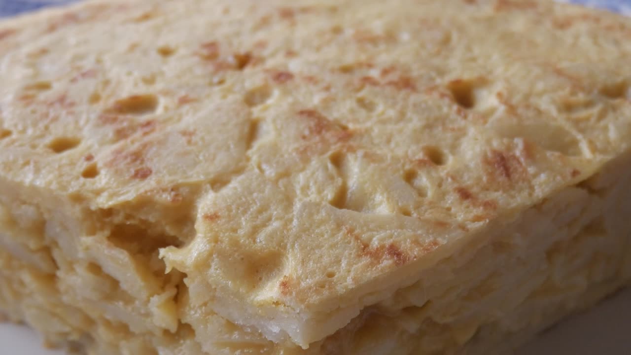 Tasty Spanish potato omelette tortilla with soft texture, golden crust, and layers of potatoes