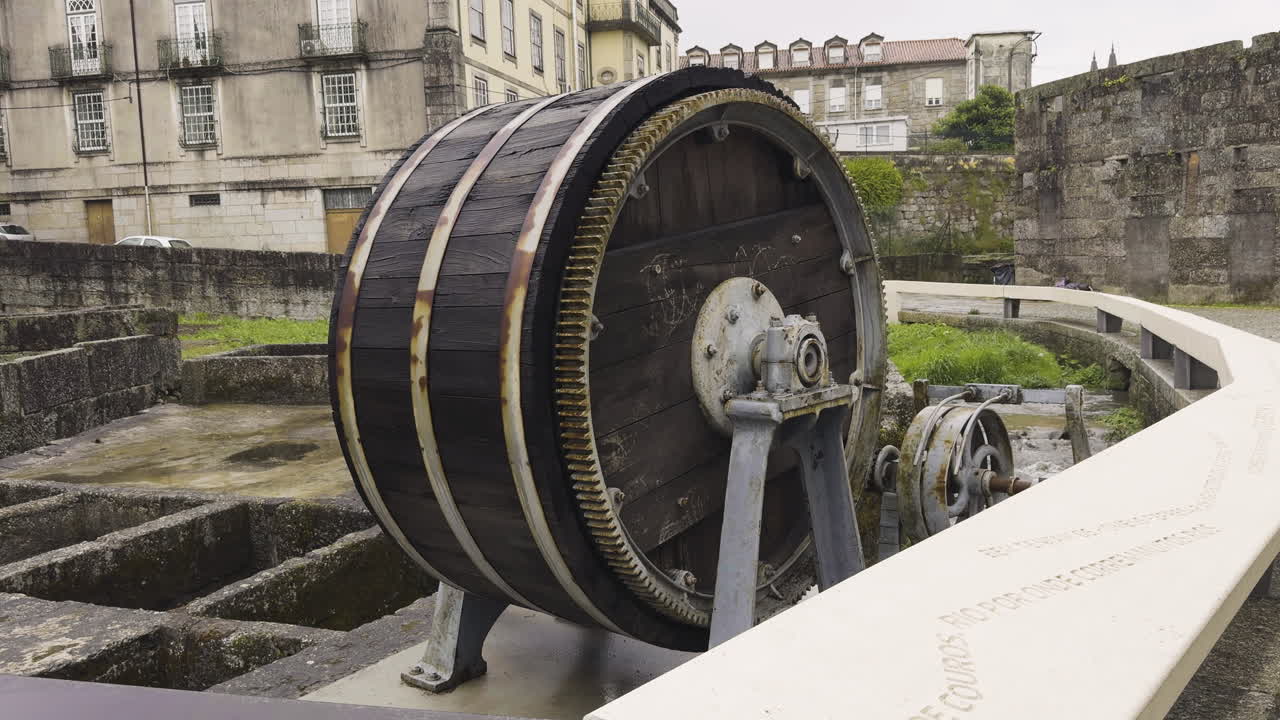 Historical Wood Barrel With A Gear Mechanism At The Guimaraes Castle