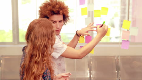 fashion students writing on post-it