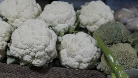 fresh cauliflower at vegetable store for sale at evening