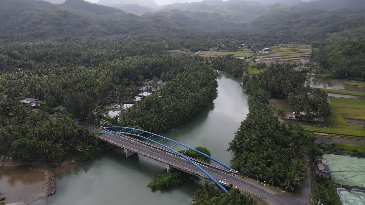 Aerial view of the Soge blue bridge, which is one of the tourist icons of Pacitan city, East Java, Indonesia