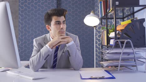 Thoughtful-businessman-looking-out-the-window.