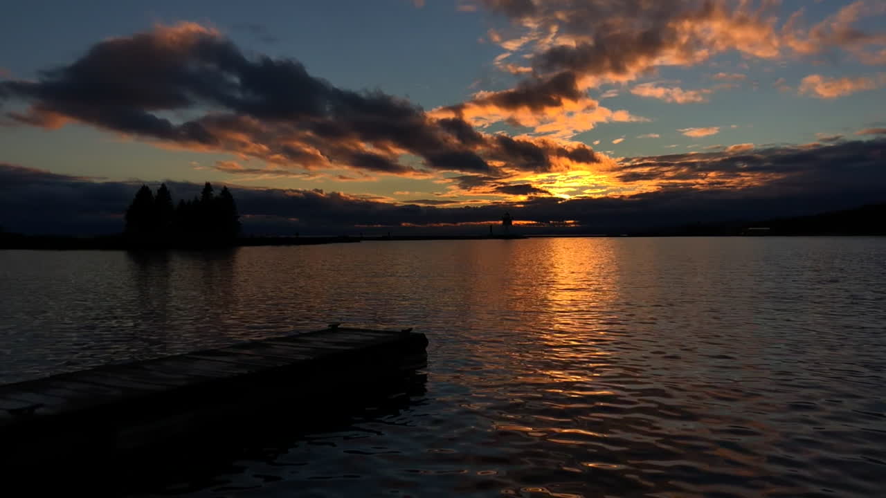 Sunset over Lake Superior in Grand Marais, Minnesota harbor