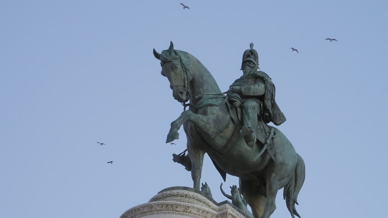 Equestrian statue of Vittorio Emanuele II with birds on the background, Rome, Italy