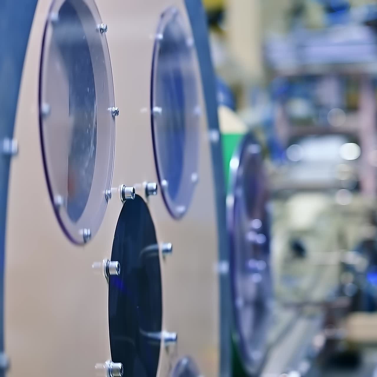 Large diameter rotating mechanism at the diaper production enterprise. Technological equipment for modern nappies manufacturing in blur