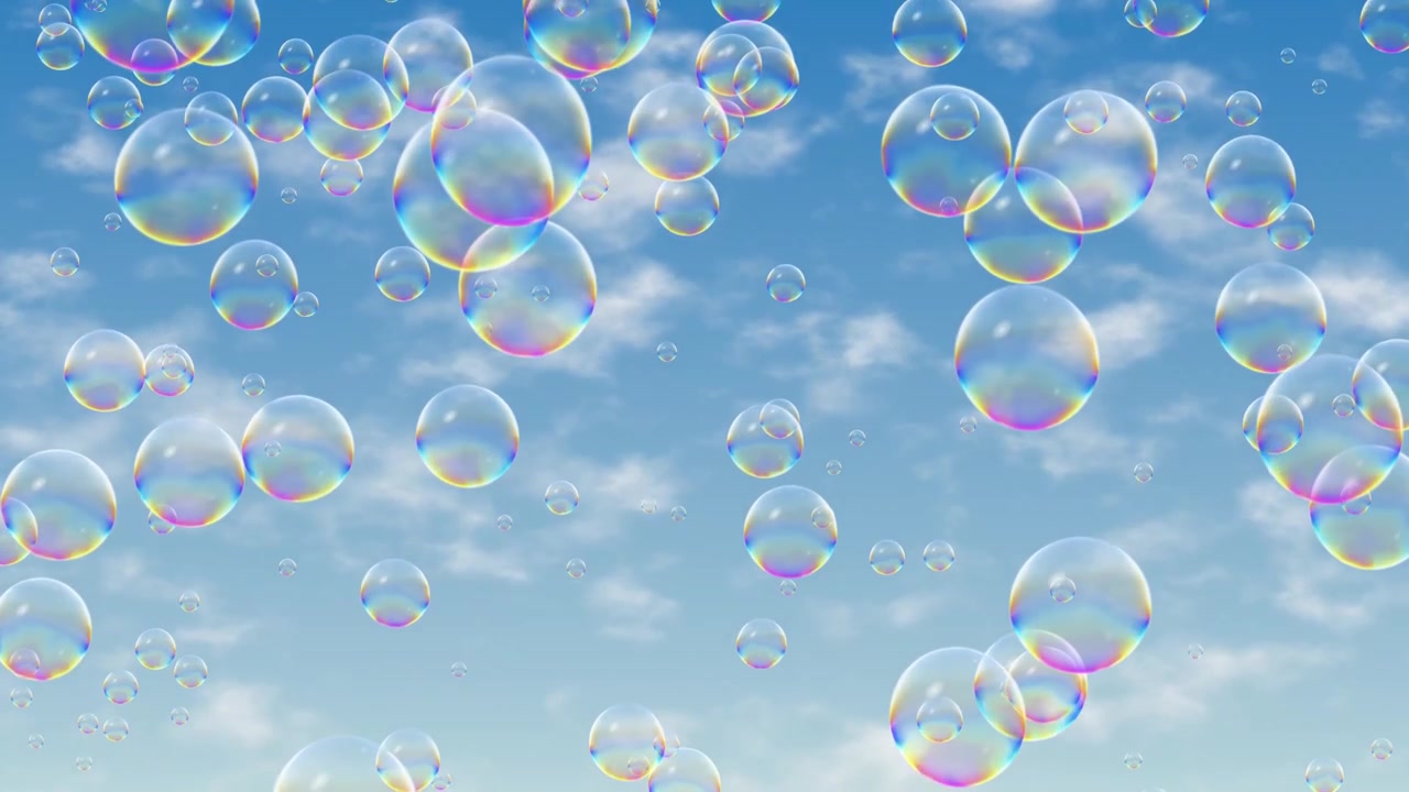 Soap bubbles drift and float peacefully across a bright blue sky filled with white clouds.