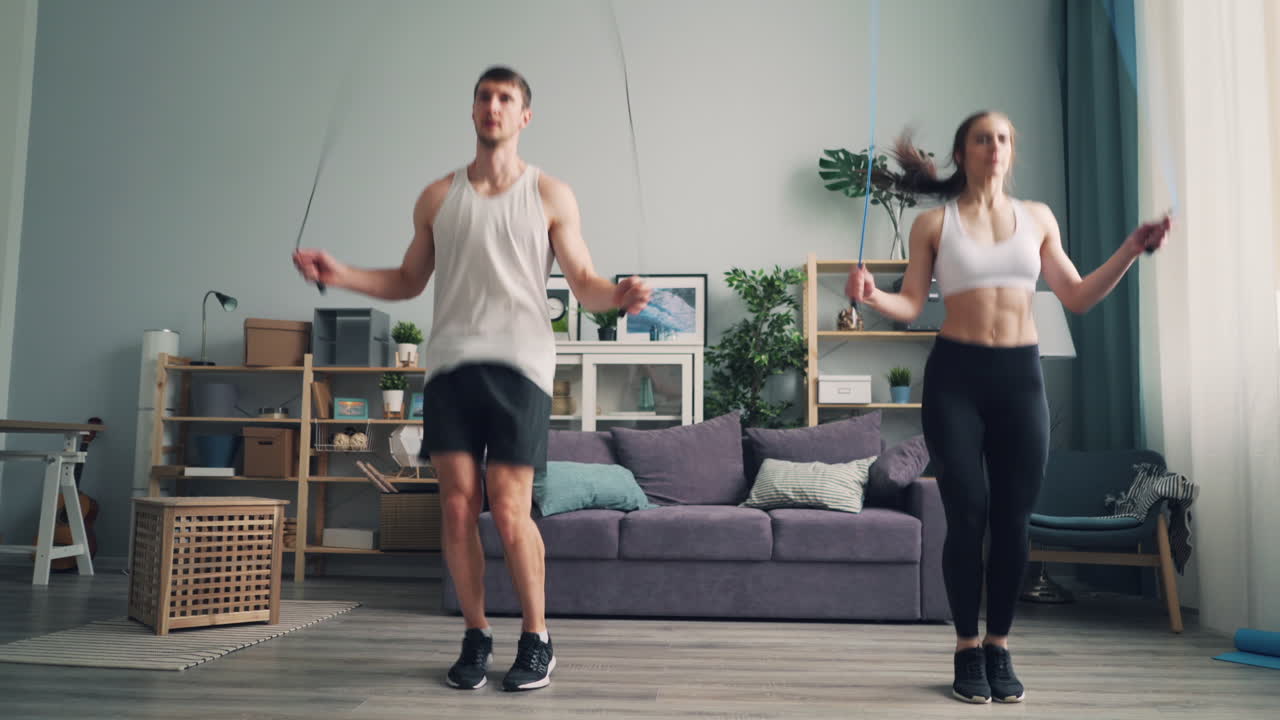 Couple Jumping Rope at Home