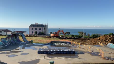 Skate-park-under-construction-with-concrete-ramps,-rails-and-street-obstacles