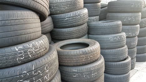 stacks of used car tires