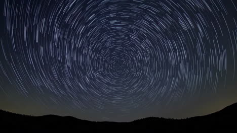 star trails over mountains