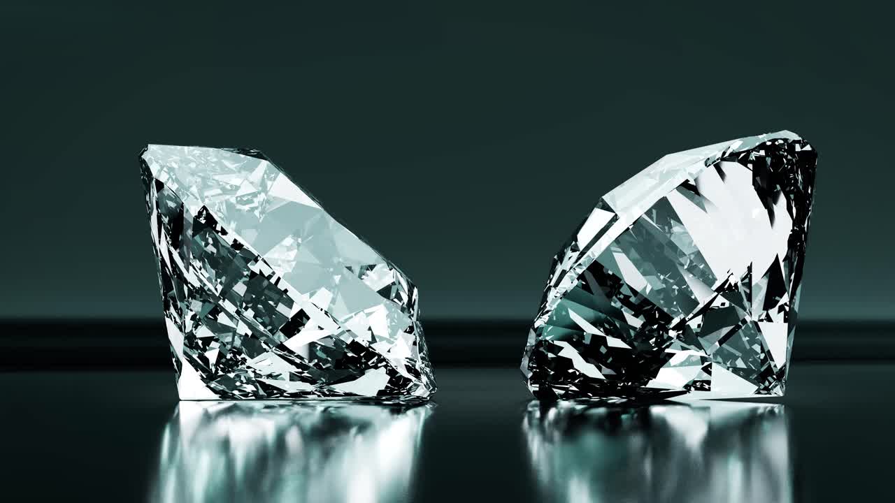 Due diamanti scintillanti su una superficie scura riflettente
