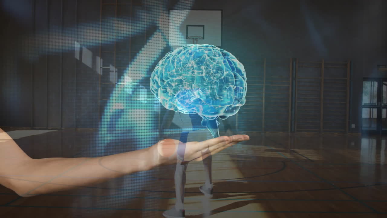 Holding digital brain hologram, person in gymnasium illustrating technology concept