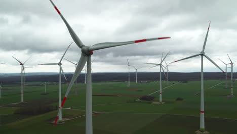 eco-friendly energy in germany: high angle view of wind turbines surrounded by farmland close to bad wünnenberg, paderborn in north rhine-westphalia