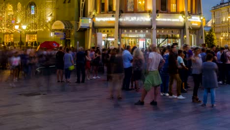 football fans and spectators have fun on the streets after the game,time lapse