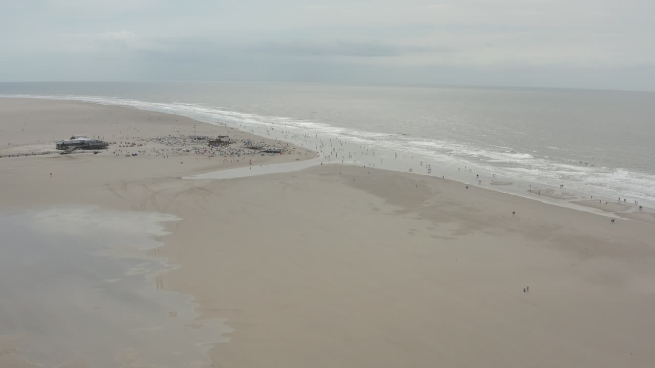 Drone - Aerial shot of the sandy beach of St. Peter Ording at the north sea, schleswig holstein, germany, 30p