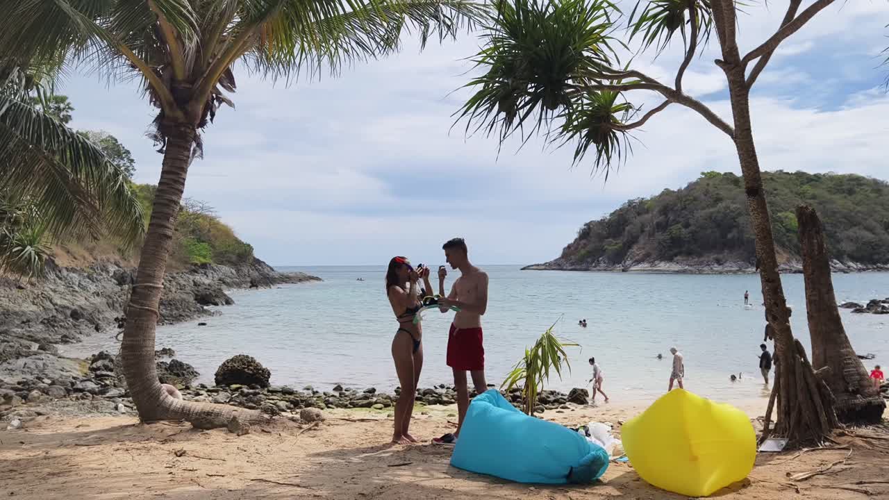 Couple enjoying a tropical beach vacation