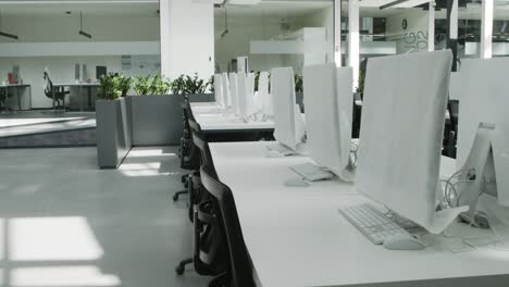 empty modern office workspace with computers