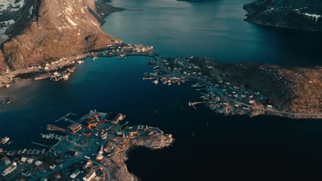 panoramic aerial view of reine and towering rocky mountains in moskenes municipality, nordland county, norway.