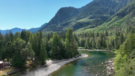 Aerial-view-of-the-Skykomish-River-passing-through-Baring,-Washington