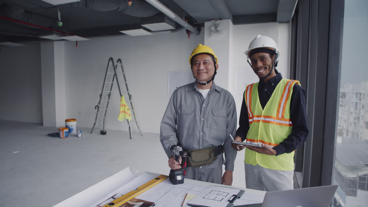 Portrait of Diverse Engineer and Foreman on Construction Site