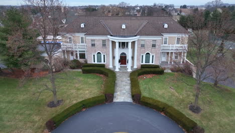 aerial of home stately sprawling mansion