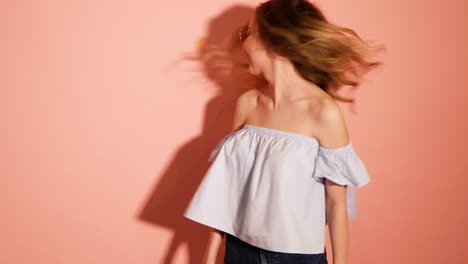 woman with long hair in light blue off-the-shoulder top