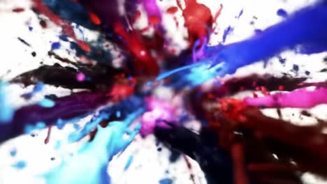 a vibrant explosion of colorful paint splashes creating a dynamic visual effect: a mesmerizing display of artistic expression and fluid motion