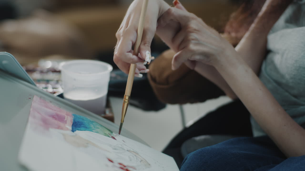 Woman Painting with Assistance
