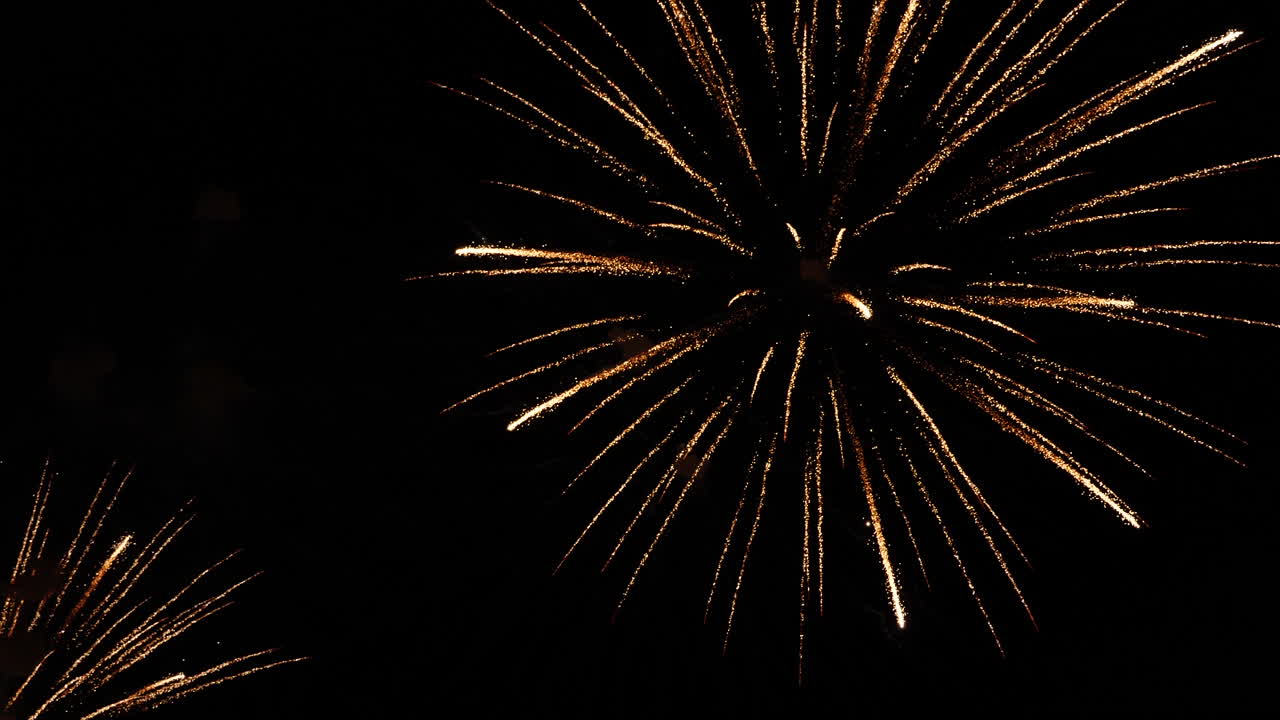 Golden Fireworks Display in the Night Sky