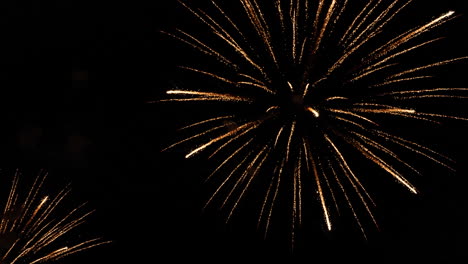 golden fireworks display in the night sky