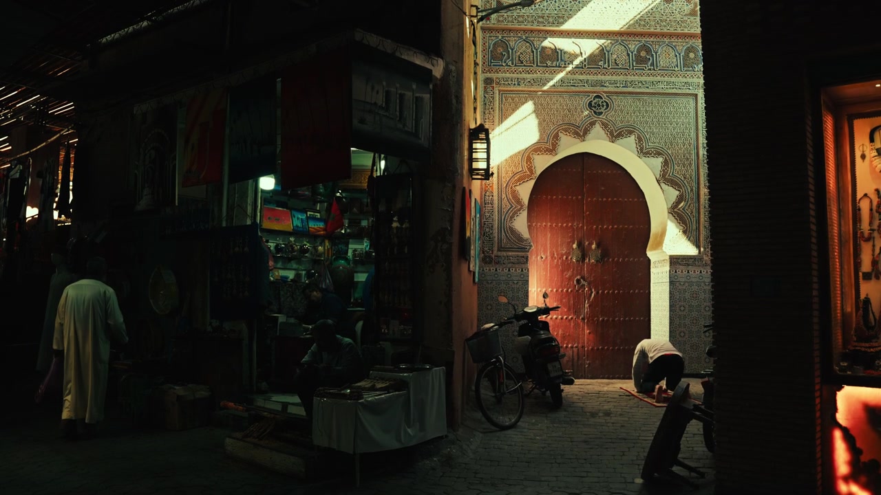 Man Praying in Traditional Moroccan Alleyway