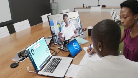 African-american-businesswomen-using-computers-with-data-processing-in-office