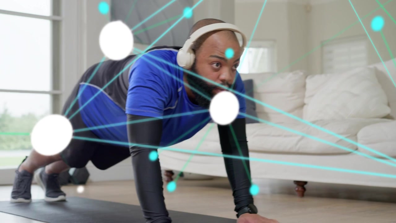 Man starting, performing alternating knee drives on mat at home, AR nodes tracking form for fitness
