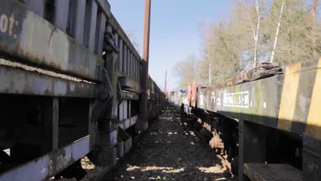 old rusty railway cars in a train yard