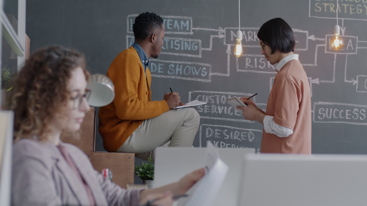 Business Team Brainstorming in Modern Office