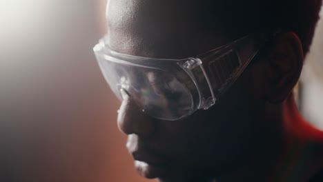 person wearing safety glasses