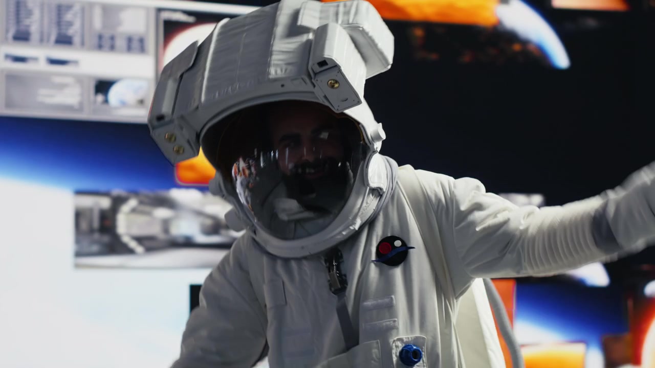 Astronaut begins cosmic journey through distant galaxy