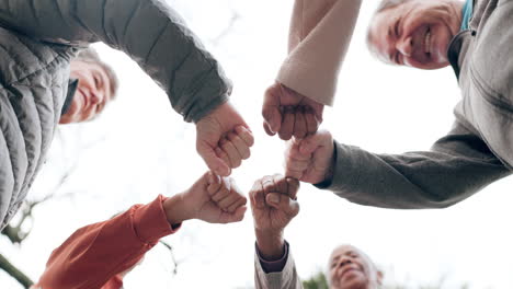 Elderly-people,-fist-bump-and-fitness-in-team