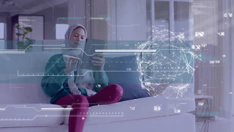 Animation-of-globe-with-network-of-connections-over-biracial-woman-in-hijab-using-tablet