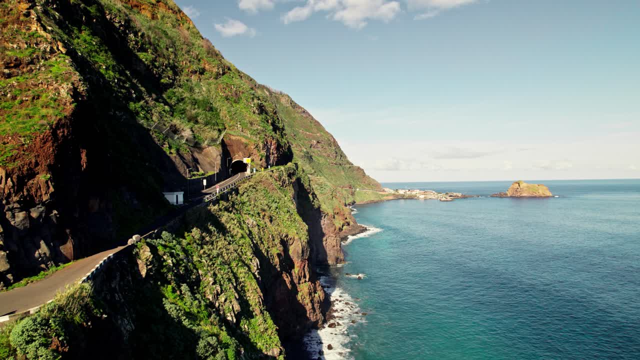 Coastal Mountain Road with Tunnel and Ocean View