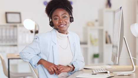 Proud-call-center-agent-wearing-a-headset