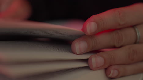 exam study, woman's fingers skilfully turning book pages