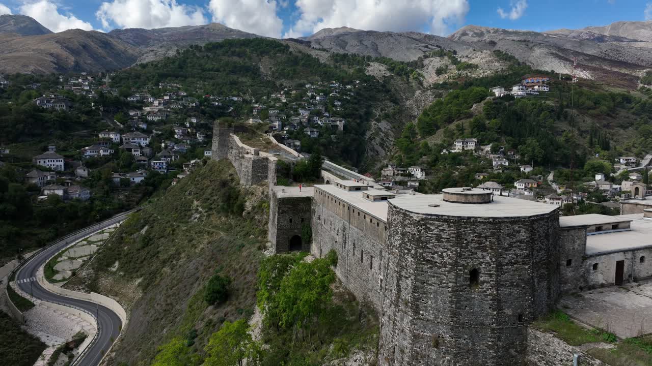 Flying Castle of Gjirokastra Over Valley In Rruga Elvia Celebi, Gjirokastër, Albania. Aerial Drone Shot