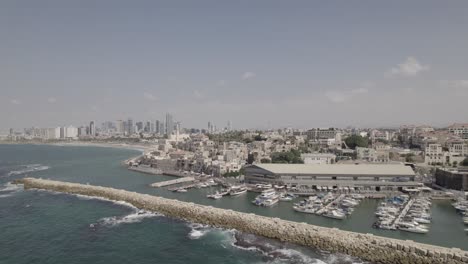 drone flying over beachside tel aviv, israel - 4k