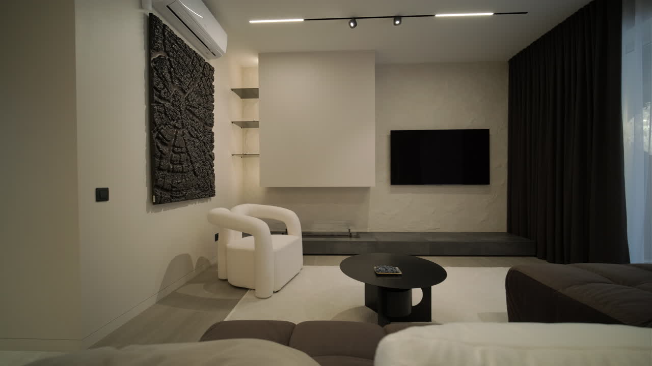 Interior de salón moderno con mobiliario y diseño contemporáneos