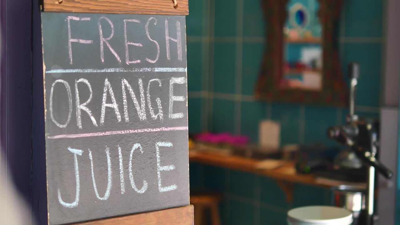 Fresh Orange Juice Sign at a Cafe