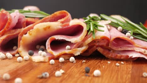 sliced smoked meat with herbs and spices