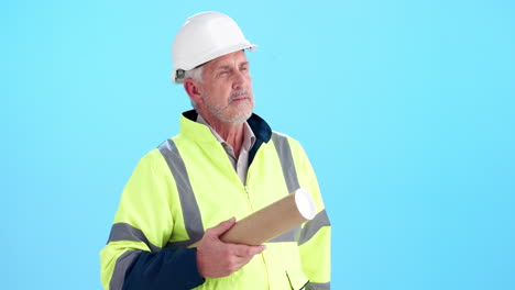 construction worker with blueprint